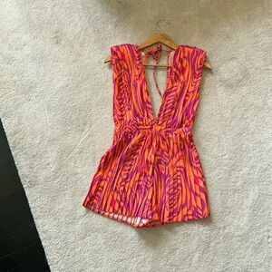 Women’s brand new pink and orange stripped romper size 0